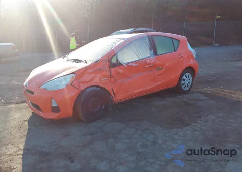 2012 Toyota Prius C from USA, damaged, VIN JTDKDTB35C1006932